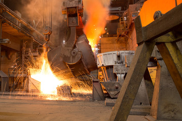 metal casting process with high temperature fire in metal part factory
