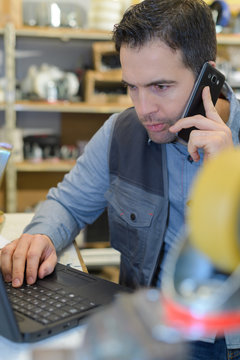 technician calling on the phone