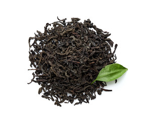 Dried black tea leaves isolated on white background. Top view.