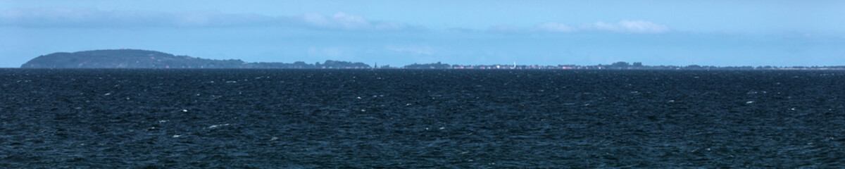 Fototapeta na wymiar Hiddensee Island with lighthouse viewed from the Darss