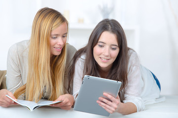 young woman using a tablet to do research