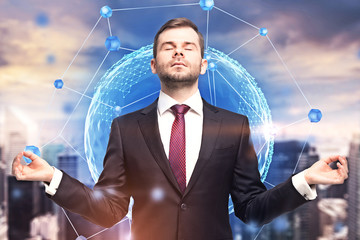 Businessman meditating in city, network interface
