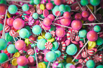 Colorful yellow, blue and pink lollipop backdrop