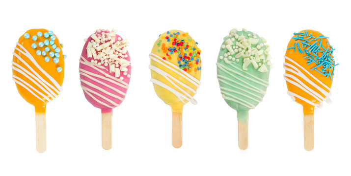 Set of different cake pops in form of ice cream isolated on white