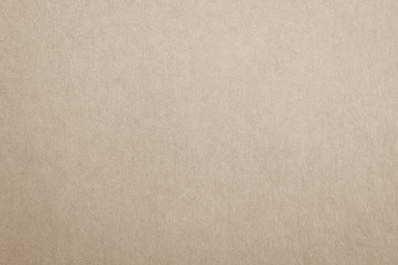 Recycled paper texture background in yellow cream brown color tone.