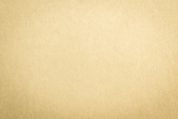 Recycled paper texture background in yellow cream color tone