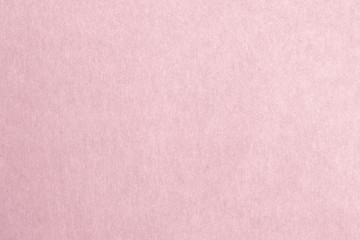 Recycled paper texture background in light pink