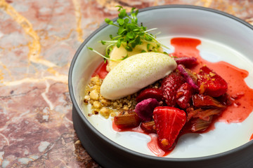 Fine dining dessert, Strawberries Parfait, ice cream, white chocolate mousse and spices