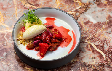 Fine dining dessert, Strawberries Parfait, ice cream, white chocolate mousse and spices