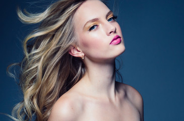 Fototapeta premium Beautiful blonde woman with pink lipstick beauty model
