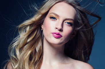 Obraz premium Beautiful blonde hair woman with beauty makeup pink lipstick