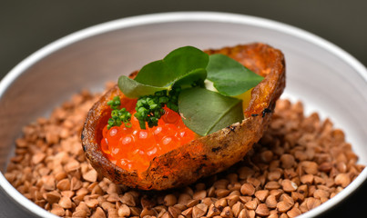 Fine dining, Elegant fish tartare with potato and caviar