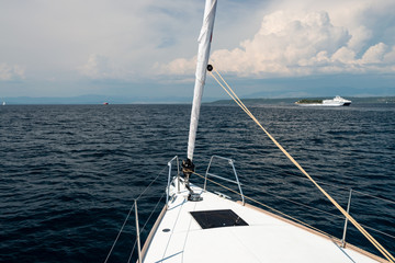 Naklejka na ściany i meble Luxury yacht at sea race. Sailing regatta. Cruise yachting