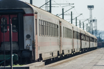 Fototapeta premium Departure of the train at the train station