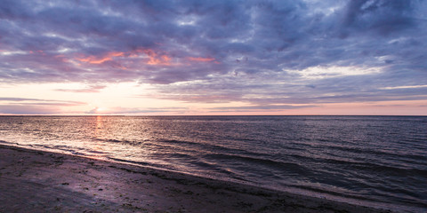 Sea beach at sunset in the Baltic Sea