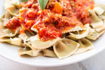 Fototapeta premium Piatto di farfalle al ragù, Italian pasta with bolognese sauce