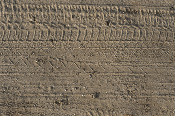 Abstract background - the wheel tracks in the sand