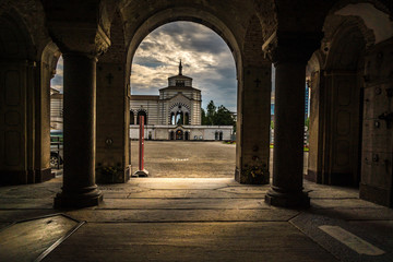 milan monumental cemetery view from inside to outside in a cloudy rainy day