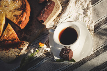 Breakfast. Coffee and pie with fruit filling on the table. 