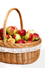 red white green apple purse basket background wood table wicker wattled braided lace
