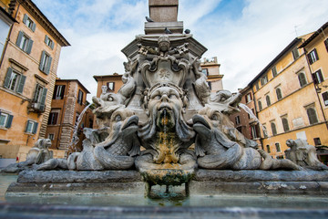 Fototapeta na wymiar The Pantheon fountain on Rotonda square in front of Pantheon