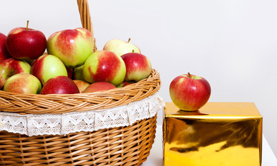 red white green apple purse basket background wood table wicker wattled braided lace golden gift box