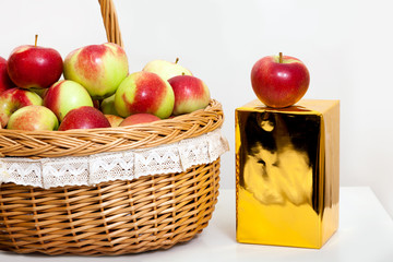 red white green apple purse basket background wood table wicker wattled braided lace golden gift box
