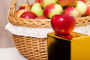 red white green apple purse basket background wood table wicker wattled braided lace golden gift box