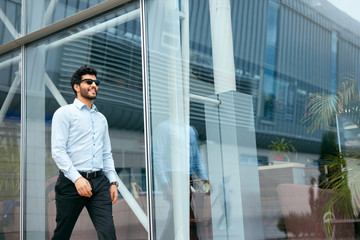 Business Man Going To Work Near Office Center