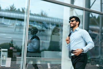 Fototapeta premium Business Man Going To Work Near Office Center