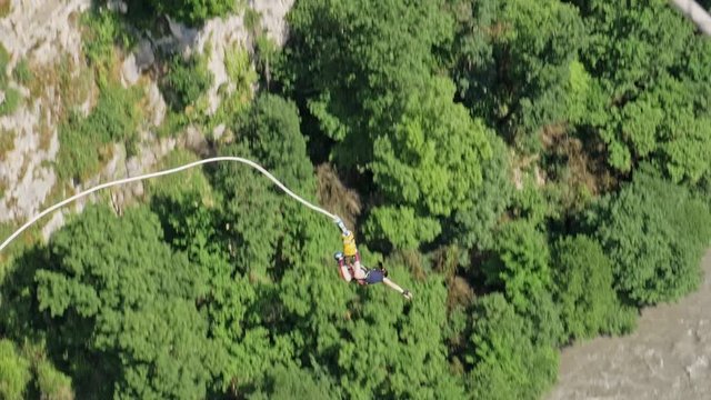 Leap from the bungee from a great height. More than 270 meters, in a mountainous area