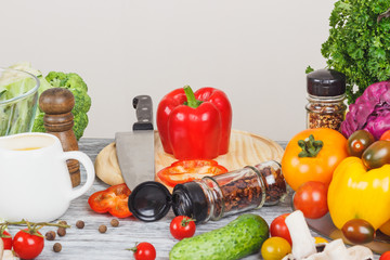 Colored vegetables and different greenery