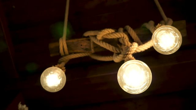 Zoom in on light bulbs against a black background. Ideea and inspiration