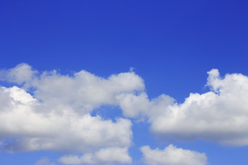 Idyllic white cloud on blue sky. Cloudscape background with fluffy cloud on blue summer sky wallpaper texture