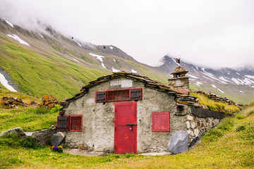 Mountain Stone Huts on Iconic Mont-Blanc Trail on a Cloudy Day