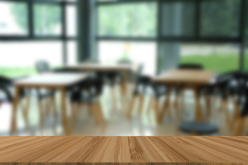 chair & table in food court canteen center. blur background