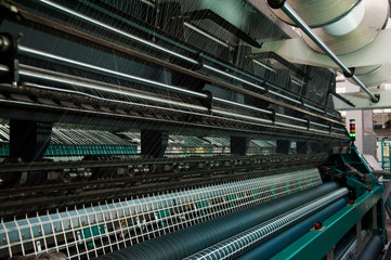 Yarn thread running in the machine