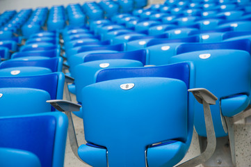 Naklejka premium Empty blue seats in stadium