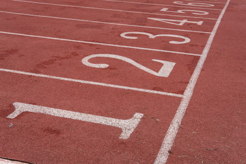 lane number & running racetrack, backstretch in outdoor sports stadium arena