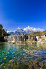 Beautiful landscapes and waterfalls in summer in Lijiang Jade Dragon Snow Mountain, Yunnan, China