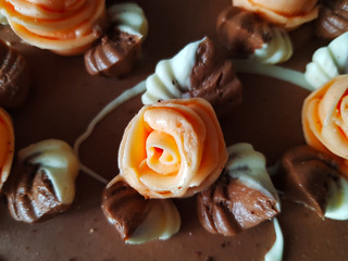 cream rose on cake