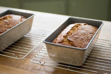 Metal forms with bread after baking