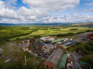 Aerial drone view of a closed, abandoned coal mine (Tower Colliery, South Wales)