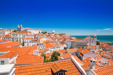 Fototapeta na wymiar Lisbon, Portugal, aerial scenic view of central Lisbon center, tile roofs and monastery Igreja Sao Vicente de Fora 