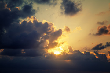 Beautiful bright dramatic sunset sky, wallpaper, natural background and texture