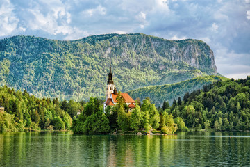 Fototapeta premium Beautiful scenery with Church on Bled Lake Slovenia