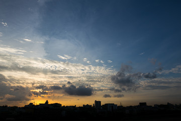 Sunset sky began to change from blue to orange at bangkok city