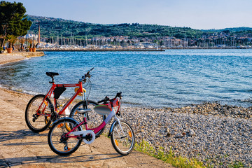 Bicycles at embankment of Adriatic Sea in Izola Slovenia