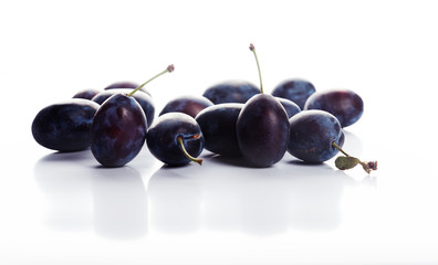 plums isolated on the white background
