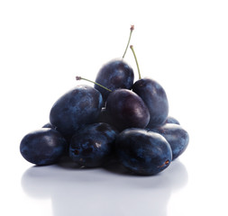 plums isolated on the white background